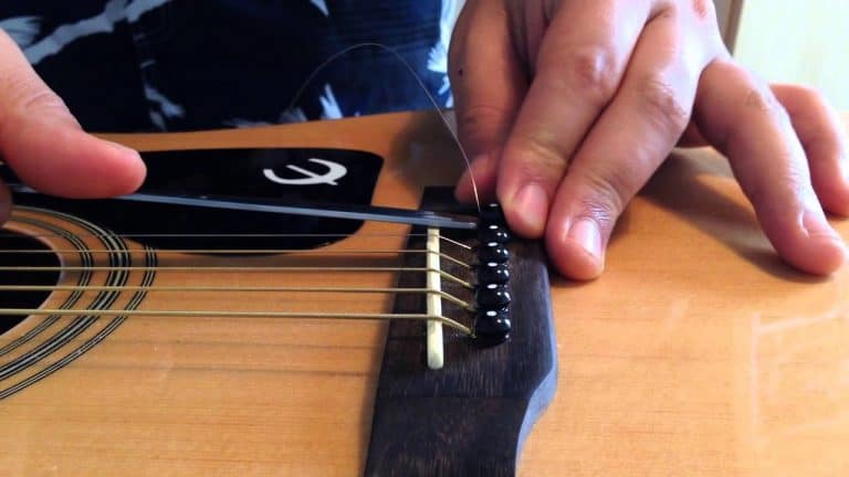 How to remove the bridge from acoustic guitar
